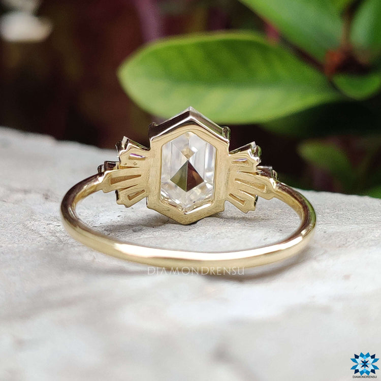 Diamondrensu UK engagement ring with tapered baguette accents.
