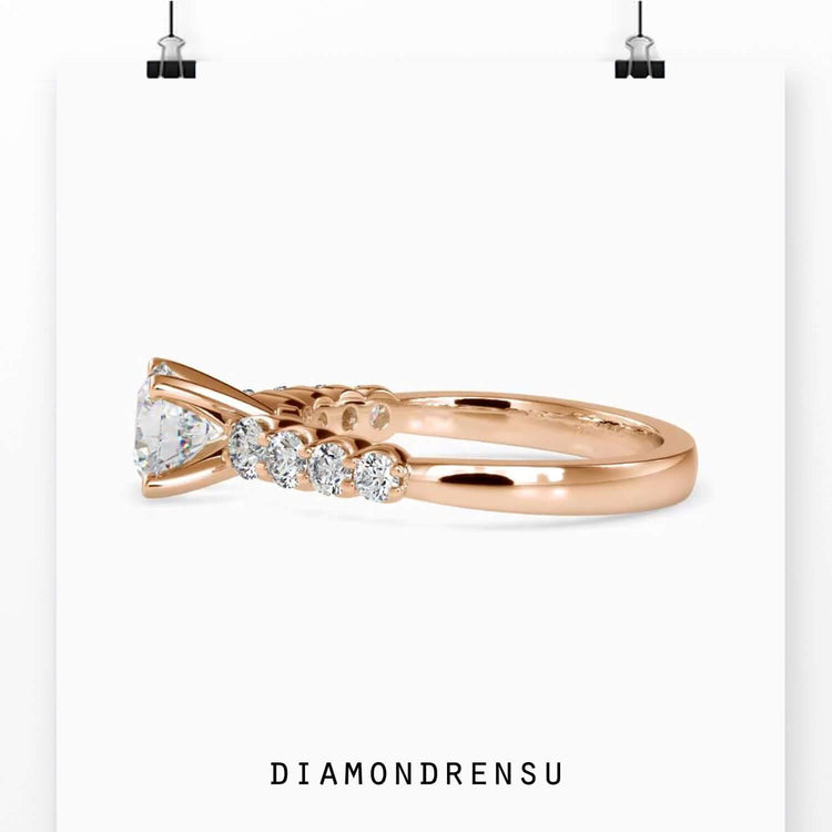 Yellow gold lab grown diamond ring with 4 prong round cut setting.
