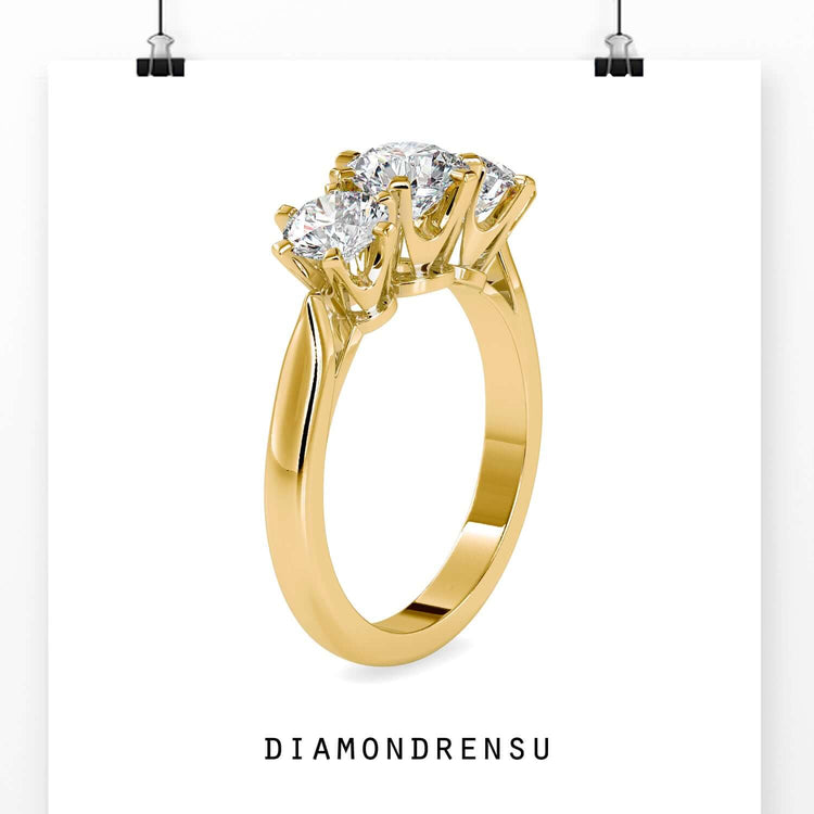 Designer ring with round diamonds and custom three stone layout.
