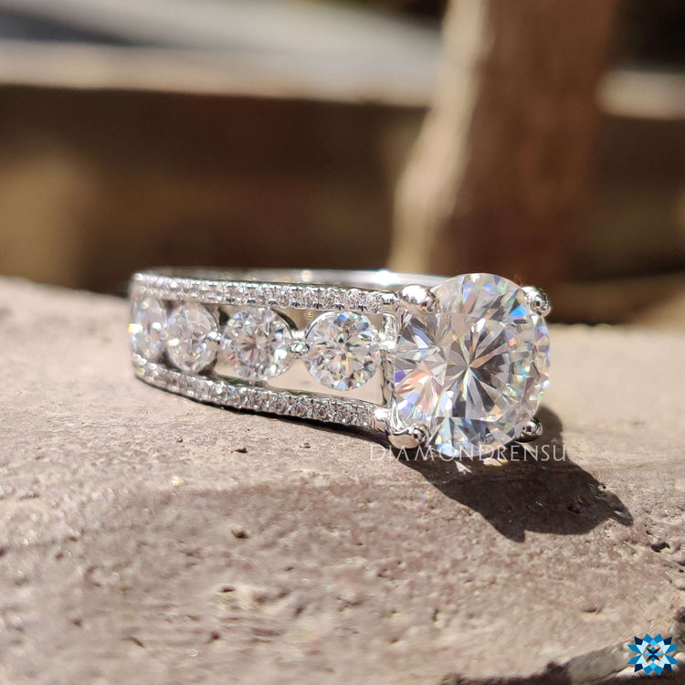 Custom moissanite ring with bubble prong setting.
