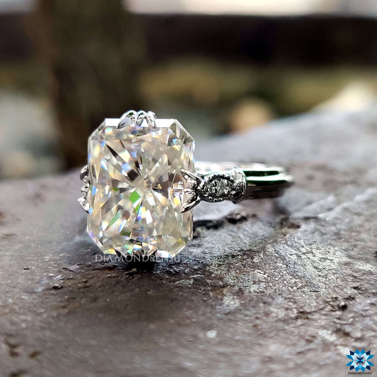 Handmade radiant engagement ring with vintage milgrain setting.
