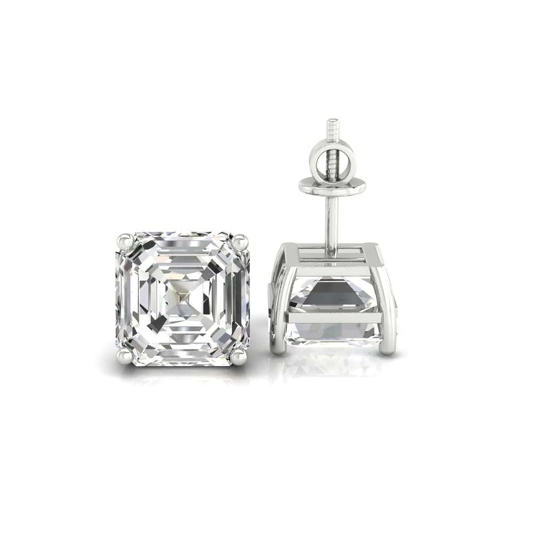 Handmade earrings crafted with asscher cut diamonds.
