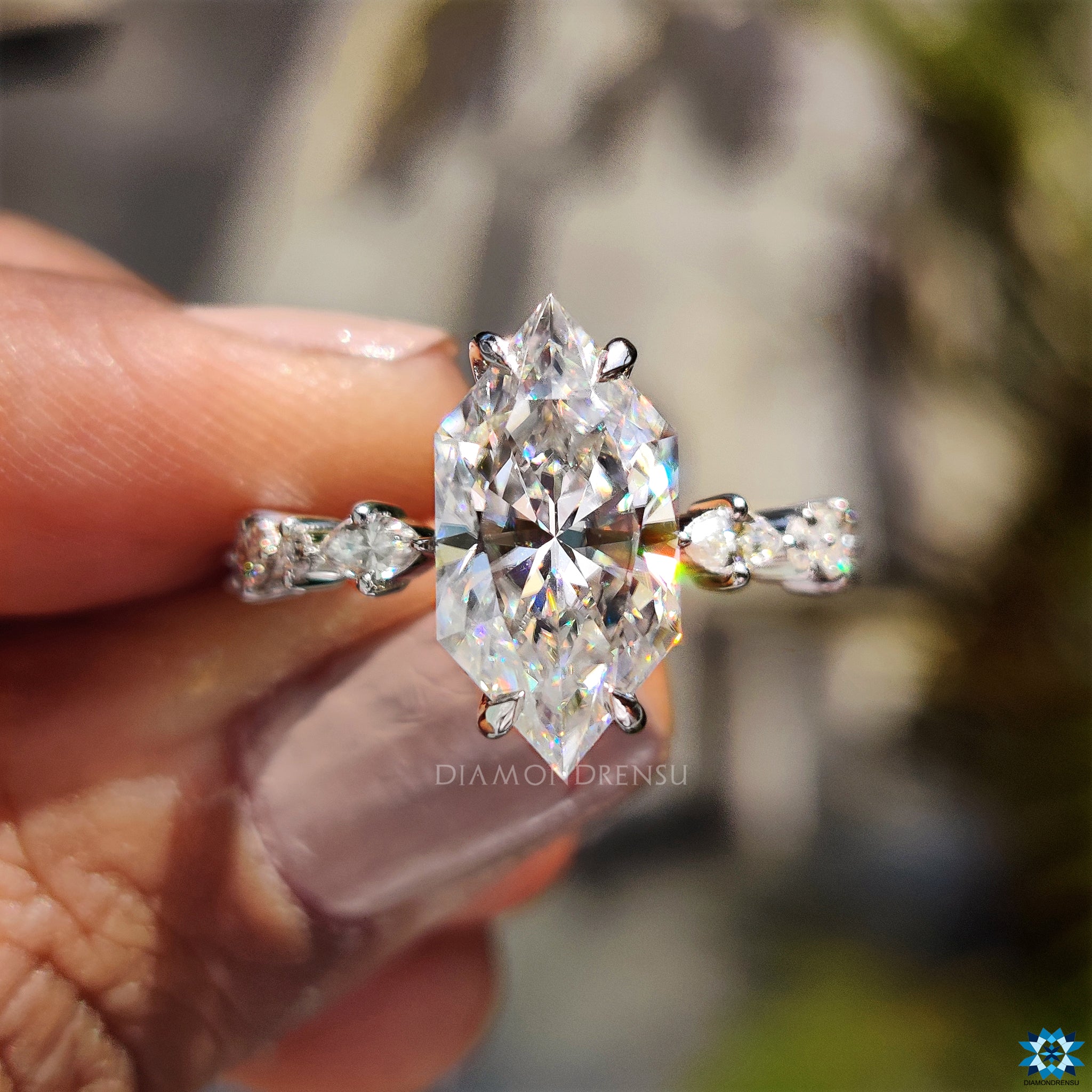 Moissanite for engagement ring set in four claw and halo setting.
