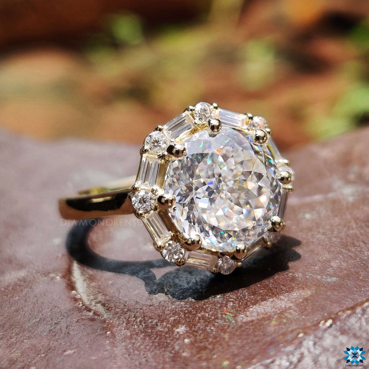 Halo setting ring with baguette and round cut accents.
