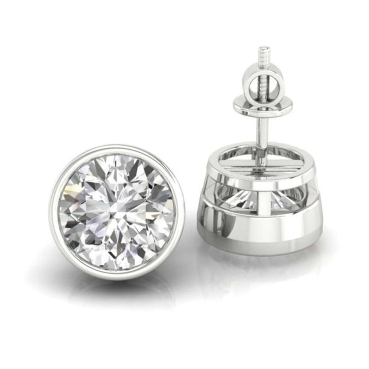 Stud earrings for women featuring round bezel set diamonds.
