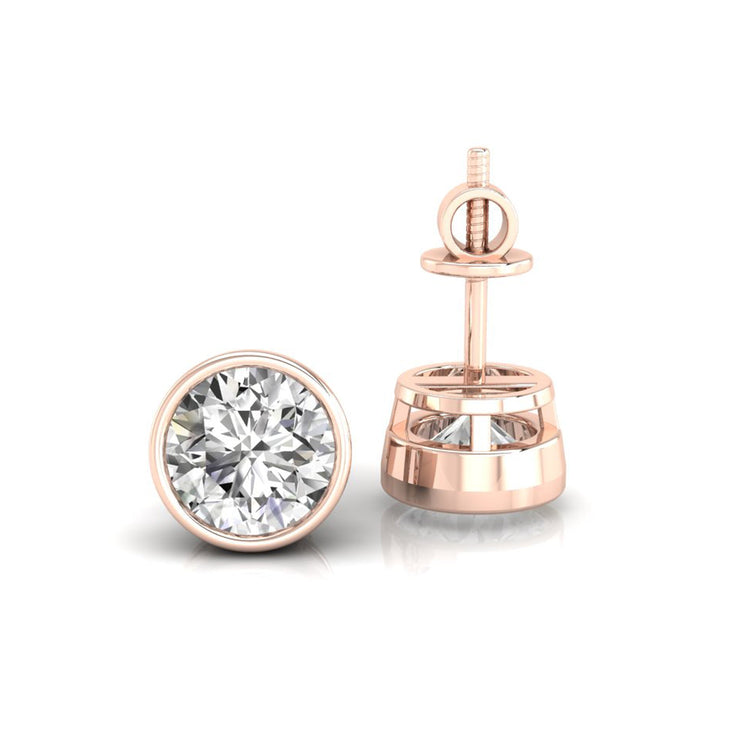 Simple and elegant white gold bezel diamond stud earrings.
