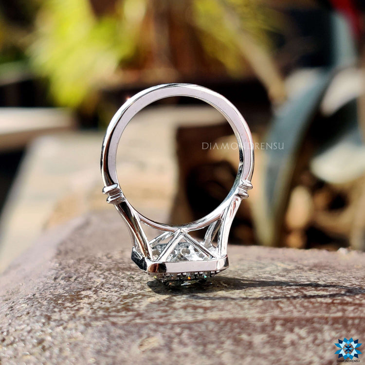 Custom engagement ring with cushion cut moissanite.
