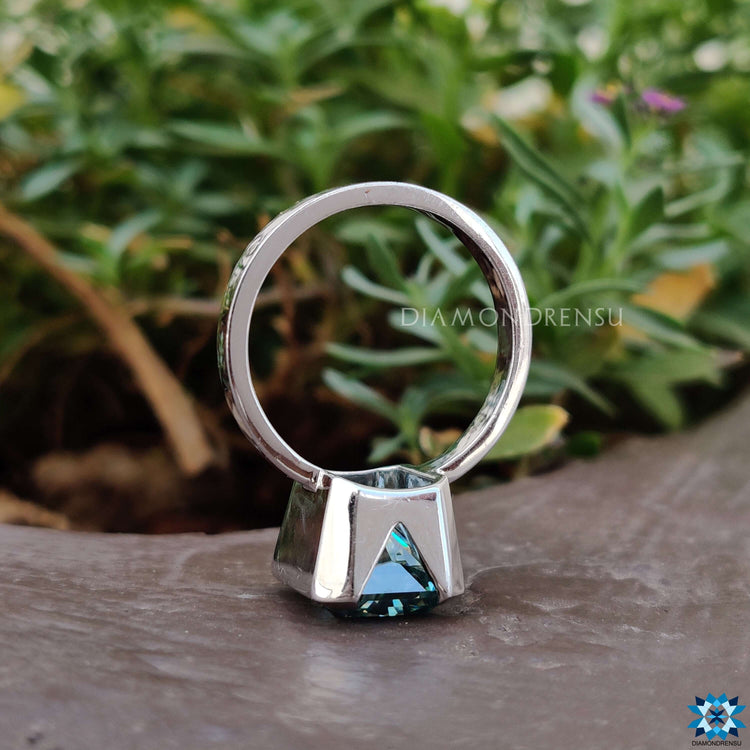 Half bezel moissanite ring with solitaire design.
