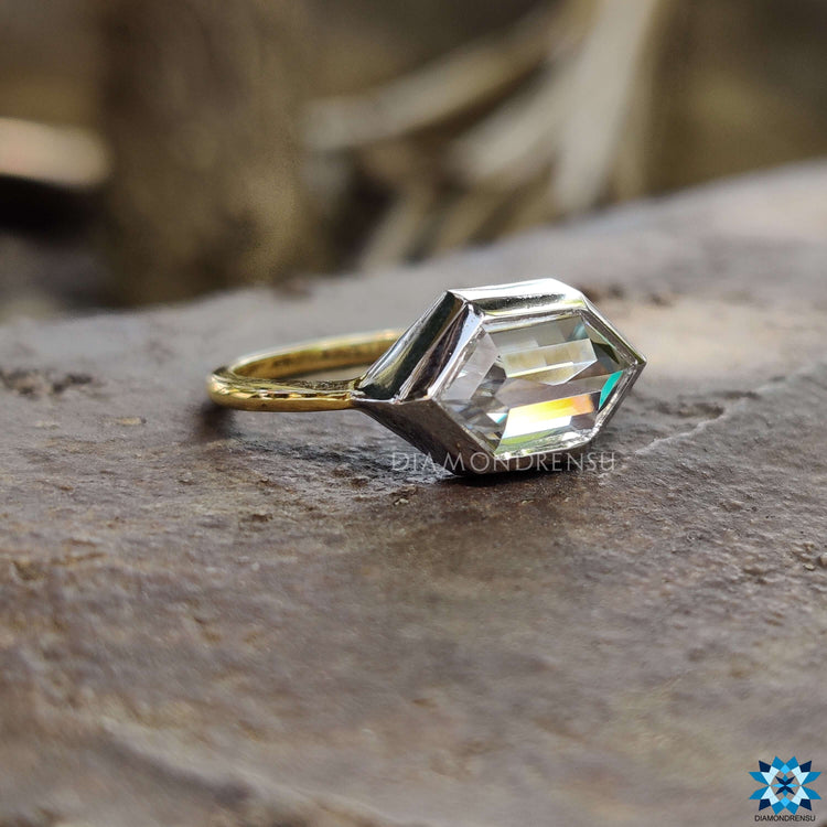 Custom hexagon bezel set engagement ring in mixed metals.
