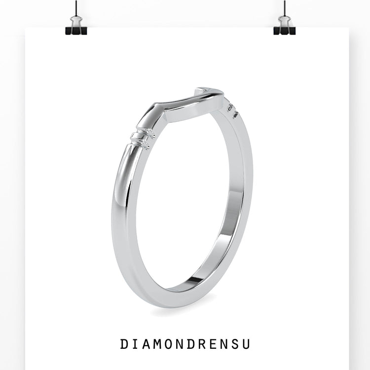 Rose gold contoured band with sleek wedding design.
