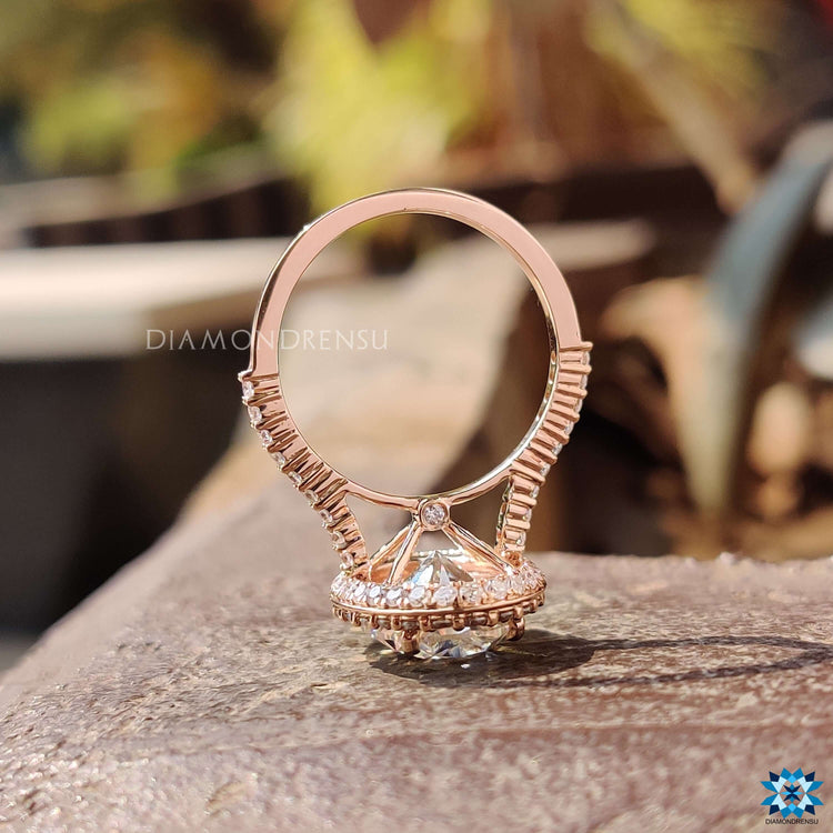 Custom engagement ring featuring oval cut moissanite.
