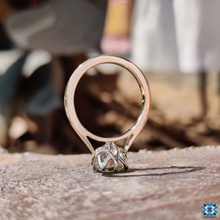 Custom engagement ring featuring Portuguese cut moissanite.
