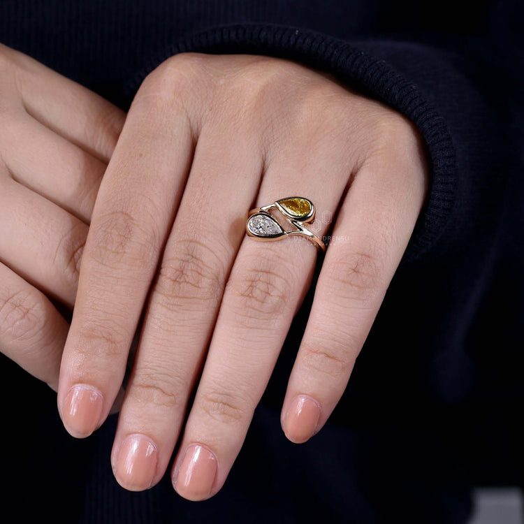 Yellow diamond ring with radiant sparkle and classic design.