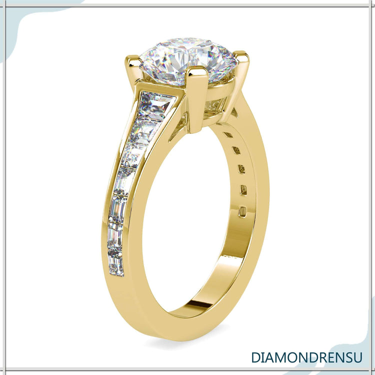 White gold engagement ring with channel set round diamond.
