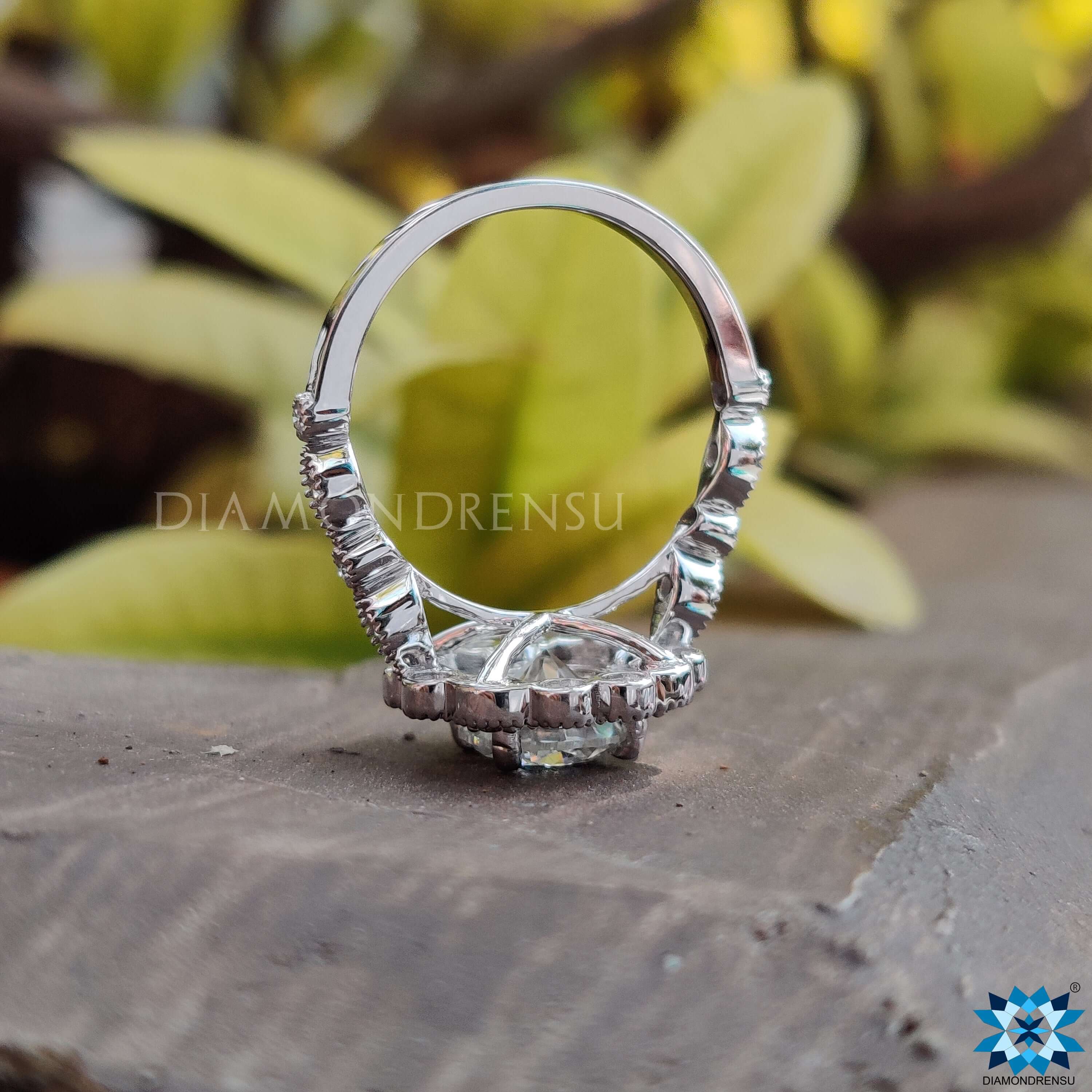 Stunning moissanite halo ring with a radiant centre stone and delicate accents.
