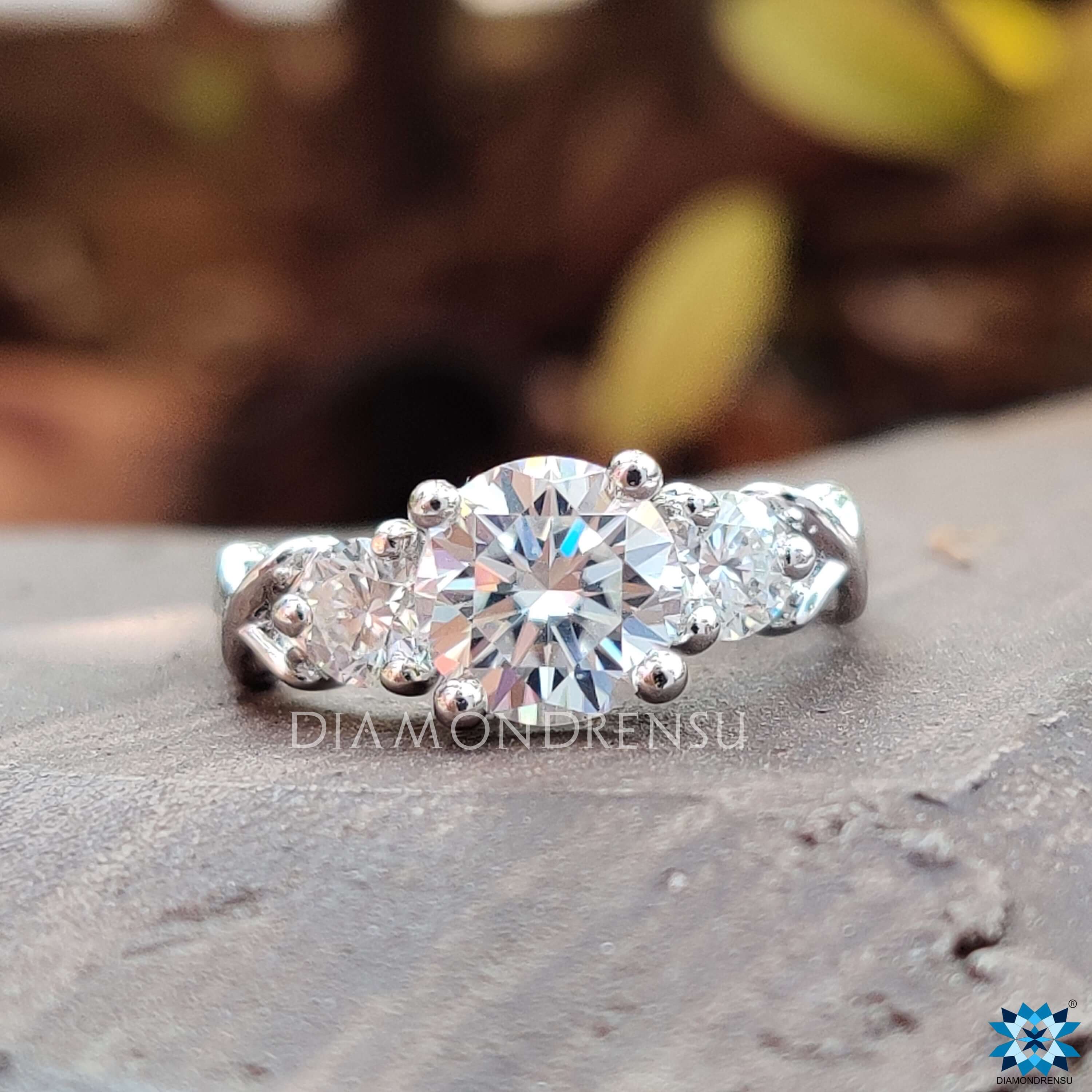 White Gold Engagement Ring with Moissanite Stones.