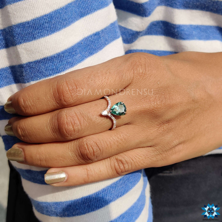 Diamondrensu UK ring with an upside down engagement ring design.