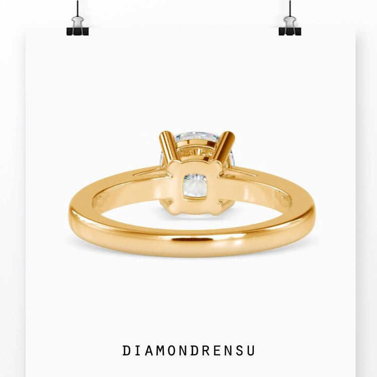 Lab grown diamond engagement ring in yellow gold with a 4 prong setting.
