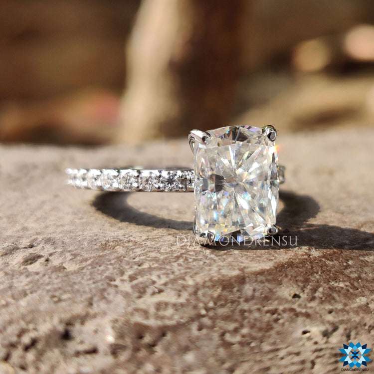 Handmade white gold ring with prong and pave settings.
