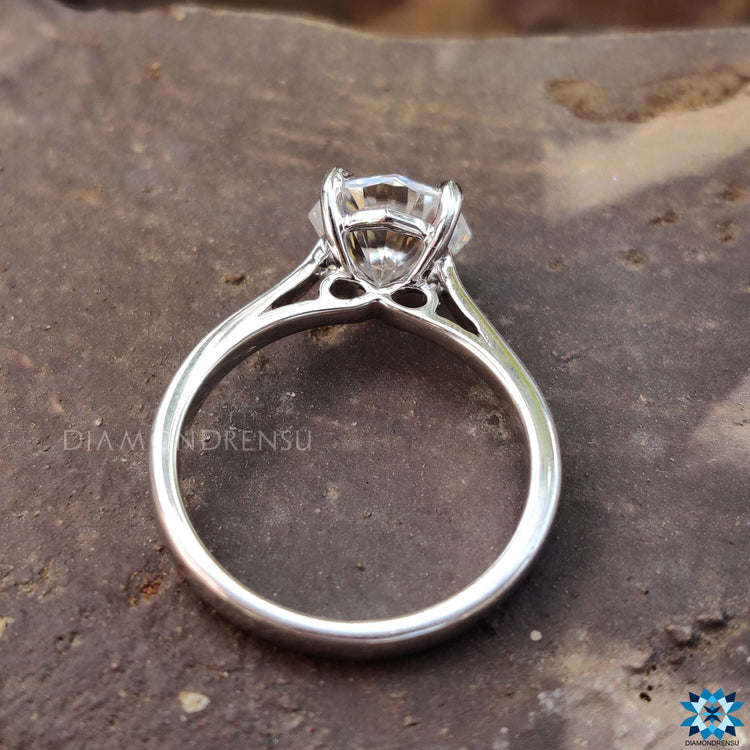 Custom white gold ring with octagon cut moissanite.
