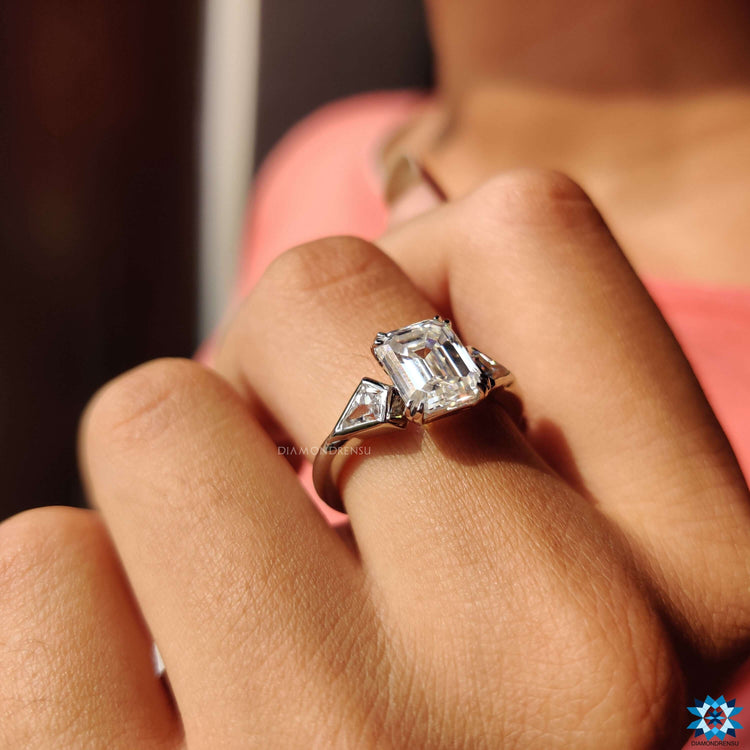 Double prong engagement ring designed as a handmade jewelry piece.