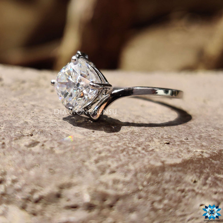 Diamondrensu UK cushion moissanite ring with bypass design.
