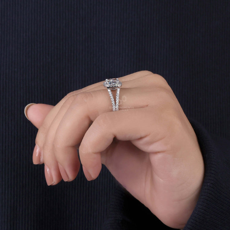 Halo ring setting paired with a handmade ring for a bespoke look.
