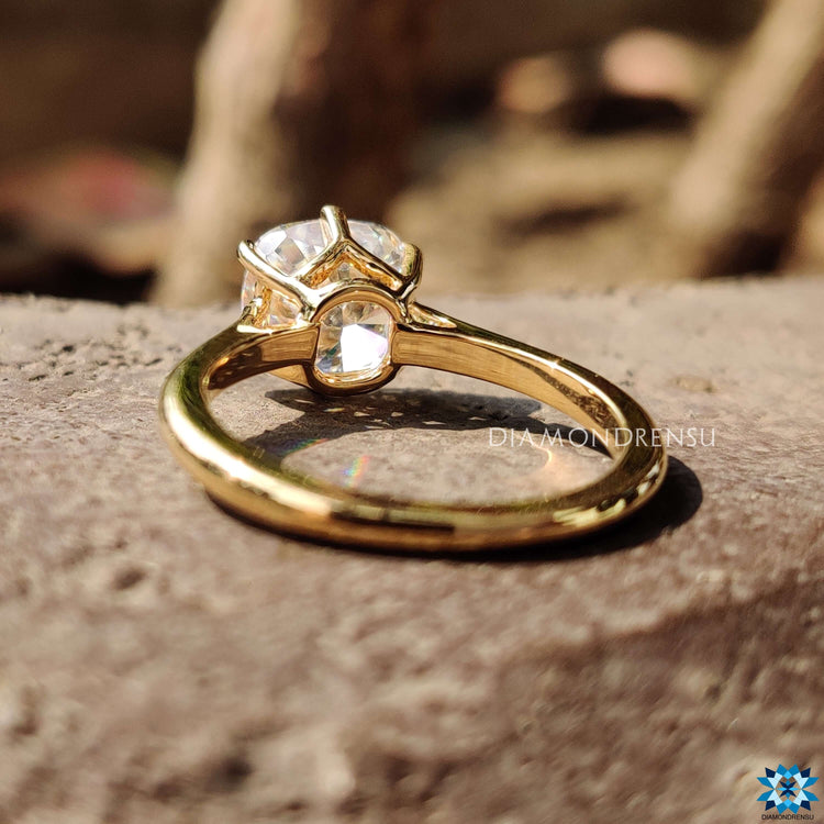Custom engagement ring with cushion cut moissanite.
