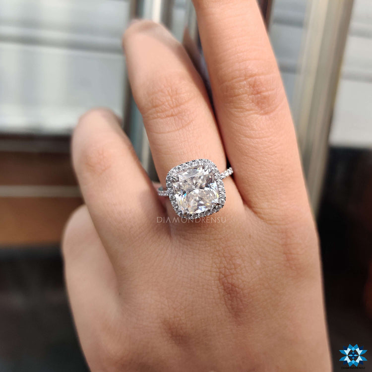 Custom engagement ring with cushion cut moissanite.
