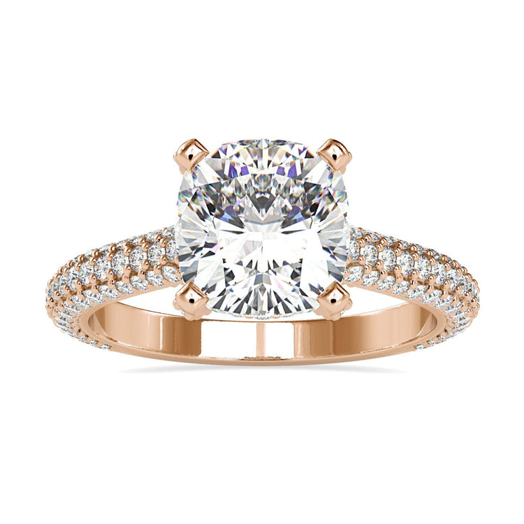 Cushion diamond ring with 4 prong setting in white gold.
