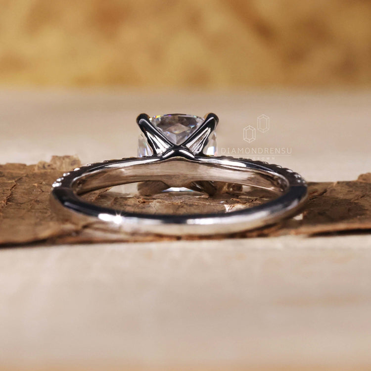 Cushion diamond in a claw prong setting, designed as a unique engagement ring for women who love timeless styles.
