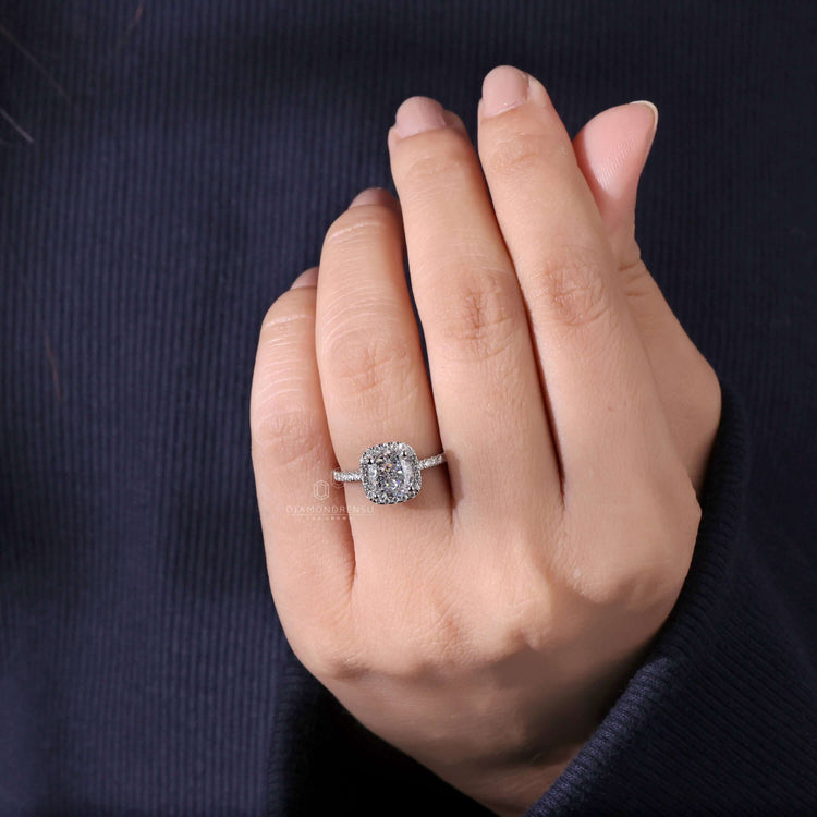 Cushion halo ring with pave band engagement ring accents for a sophisticated finish.
