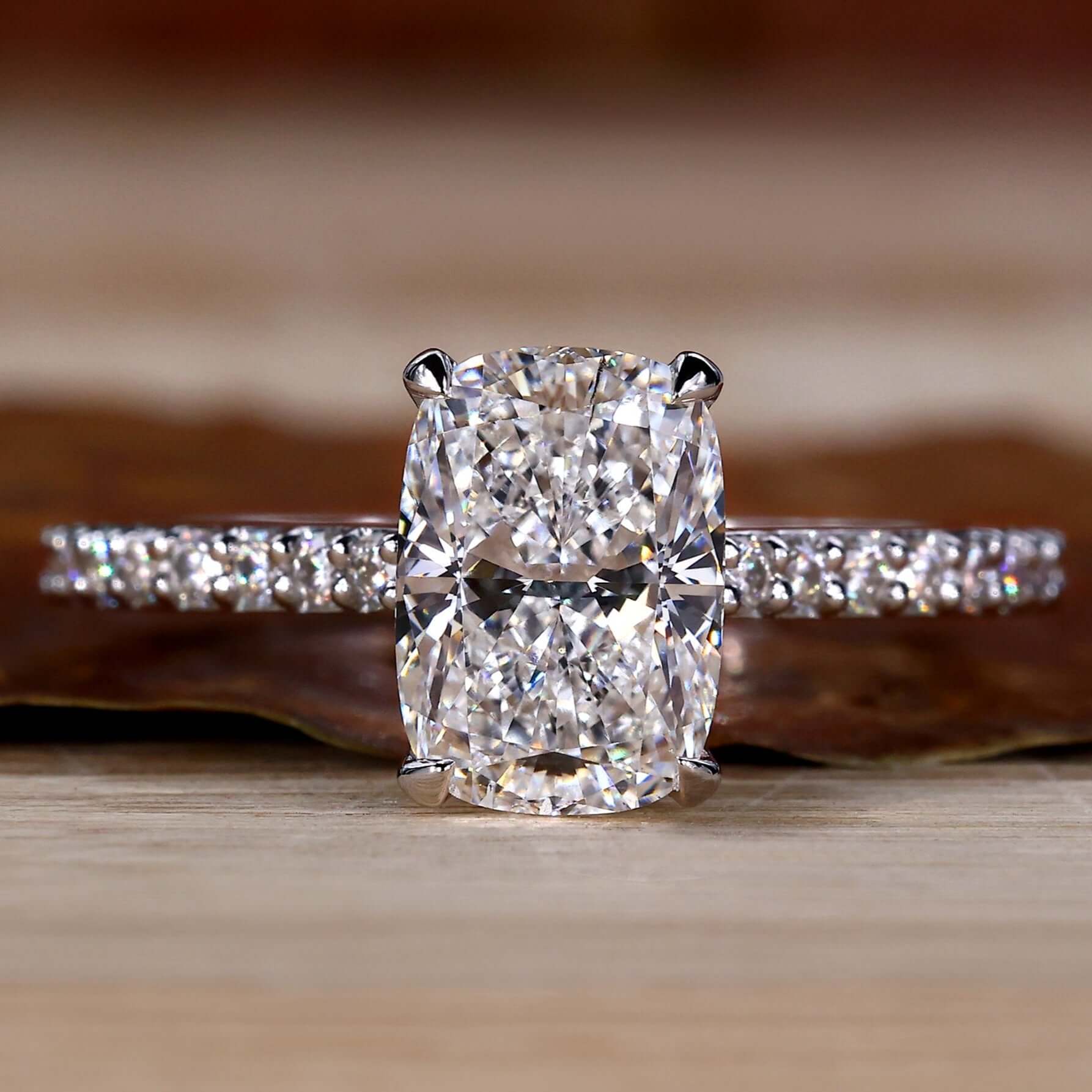 Cushion cut diamond featured in an elegant white gold ring.