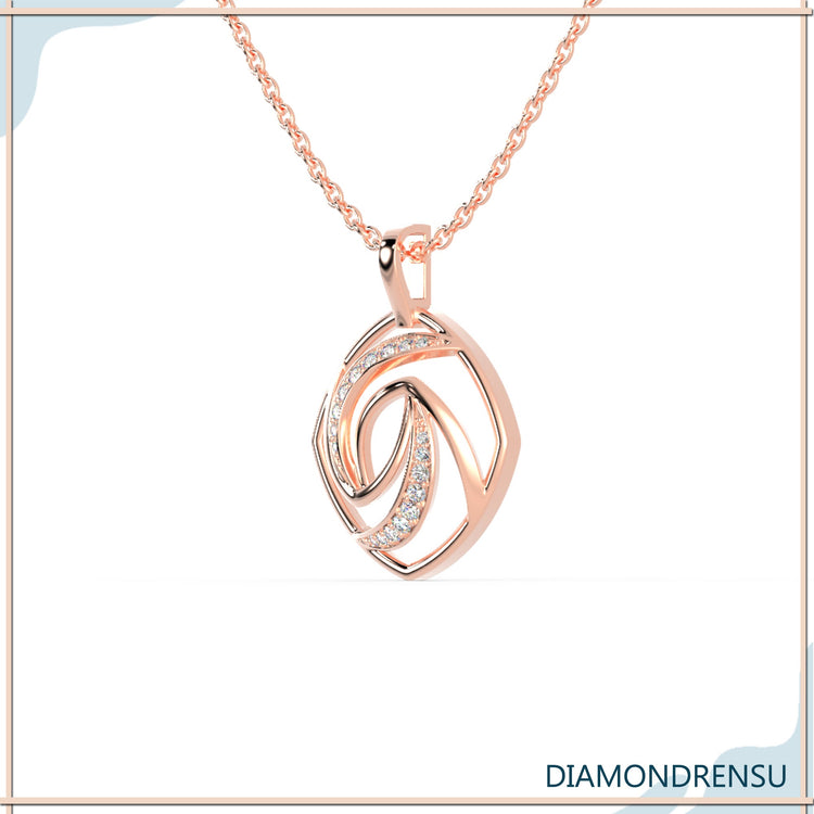 Rose gold spiral pendant with central round lab diamond.
