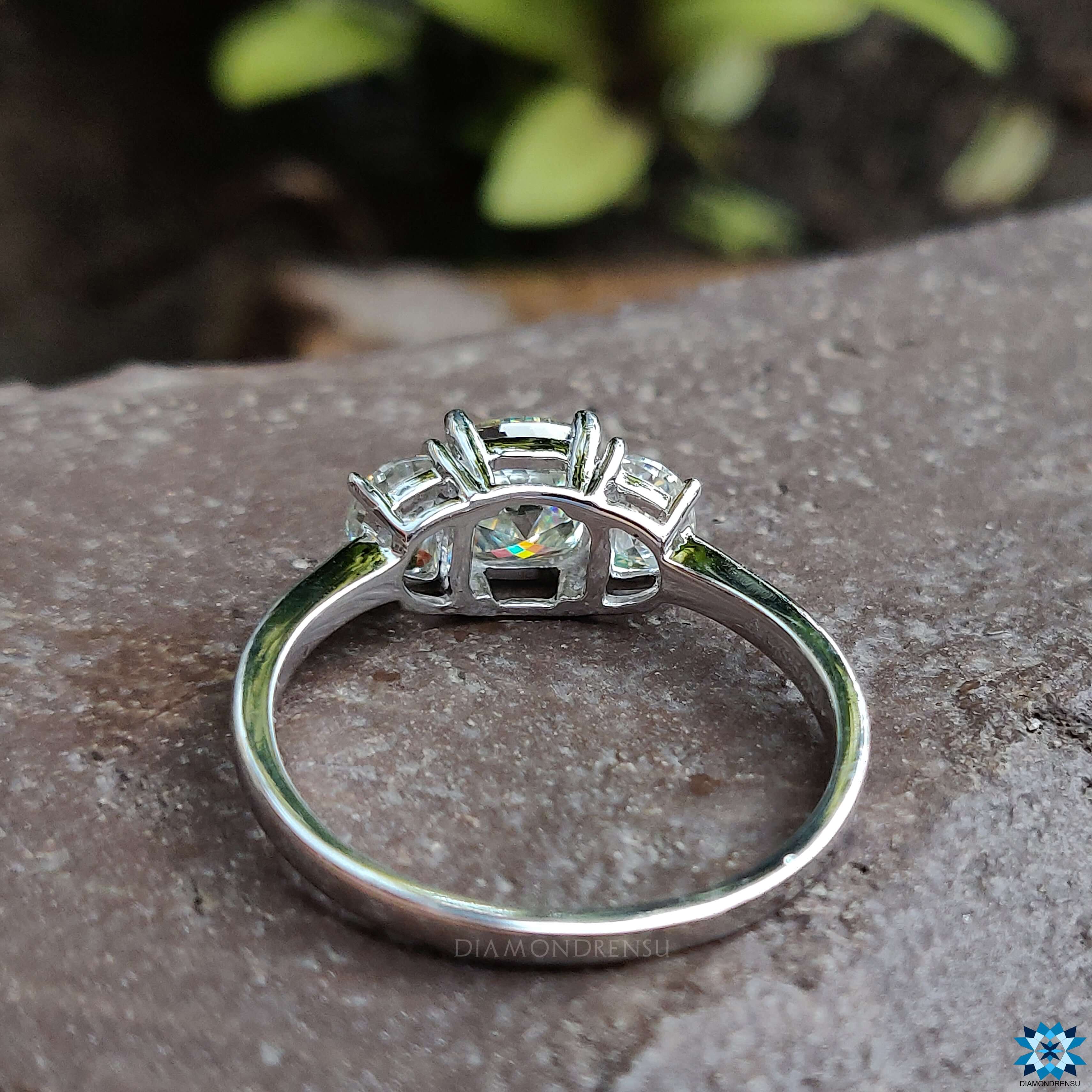 Moissanite for engagement ring set in a cushion cut ring for timeless beauty.