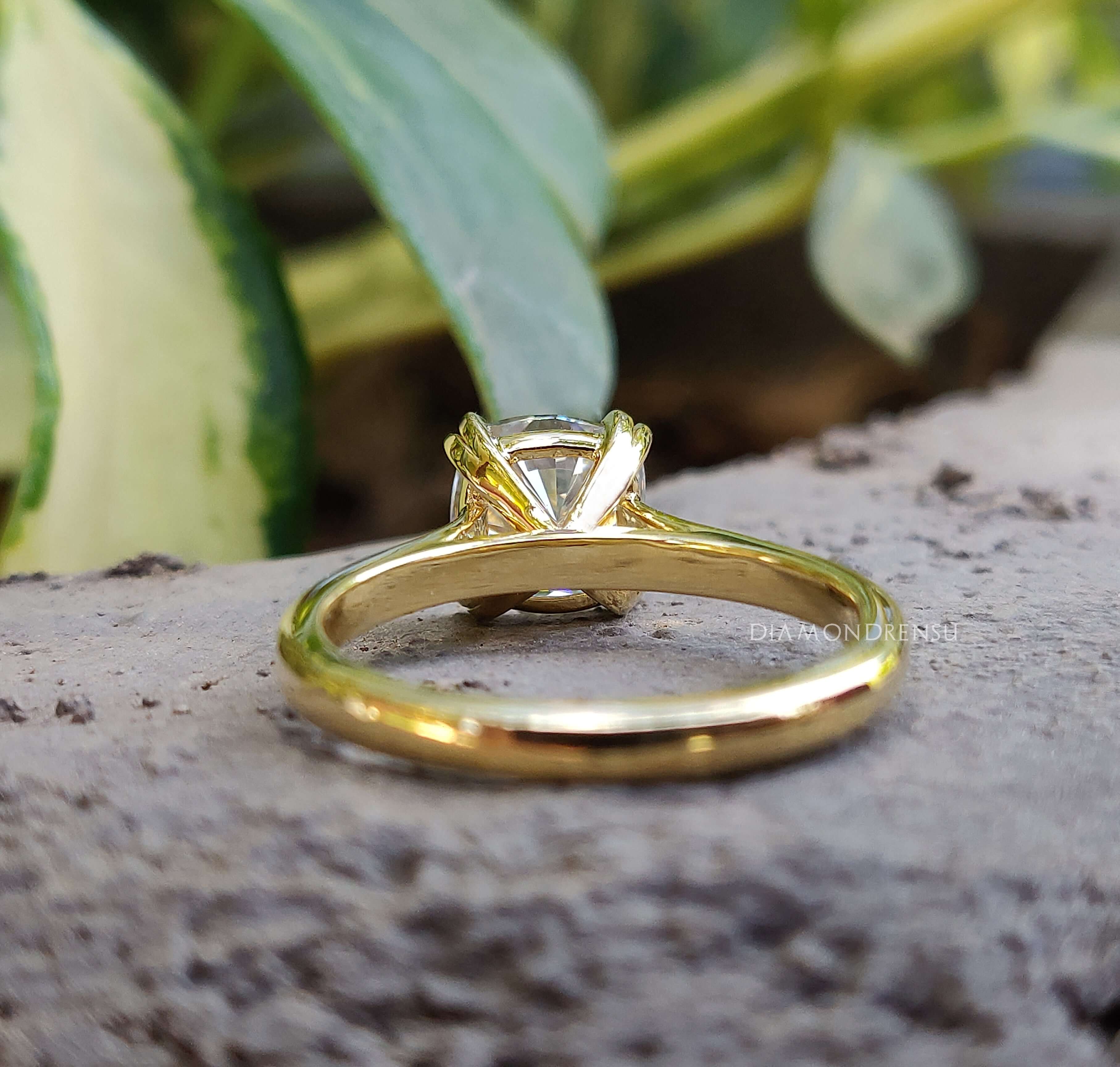 Moissanite gold ring featuring a square moissanite center stone with a Double Prong Setting.
