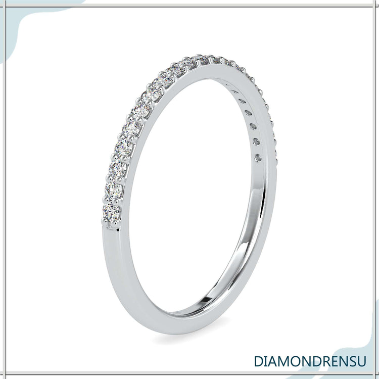 White gold classic band with lab grown round cut diamonds.
