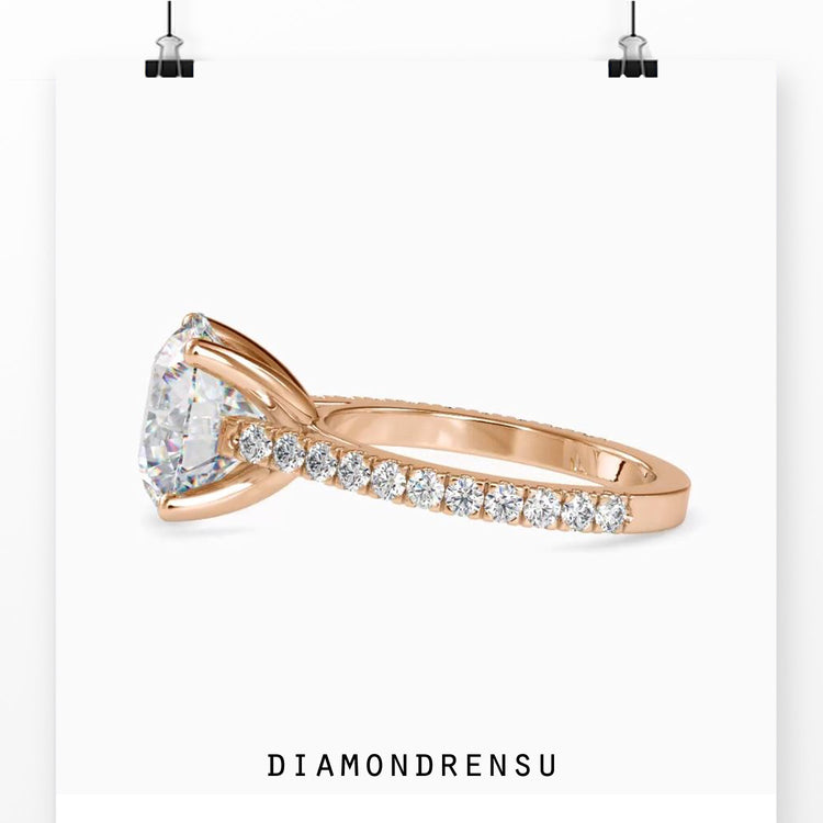 Yellow gold engagement ring shaped with a smooth and polished band.
