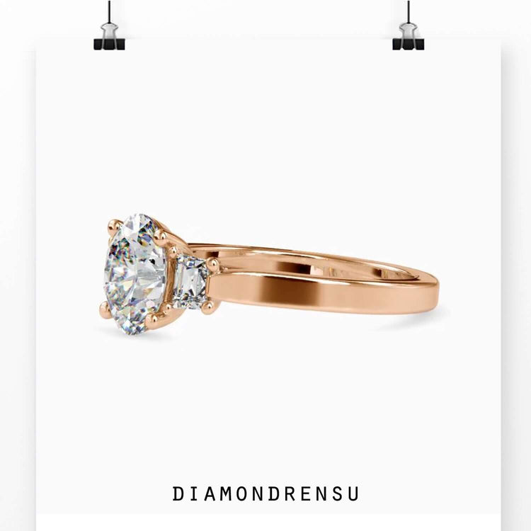Yellow gold ring featuring custom three stone layout.
