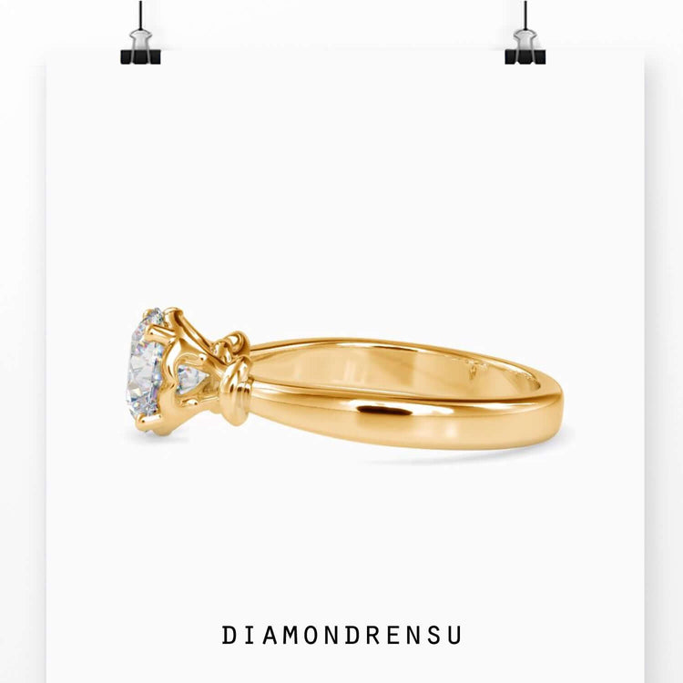 Rose gold ring with round diamond and infinity detail, UK made.
