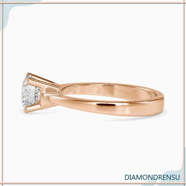 Diamondrensu UK ring with tapered shank and solitaire diamond.
