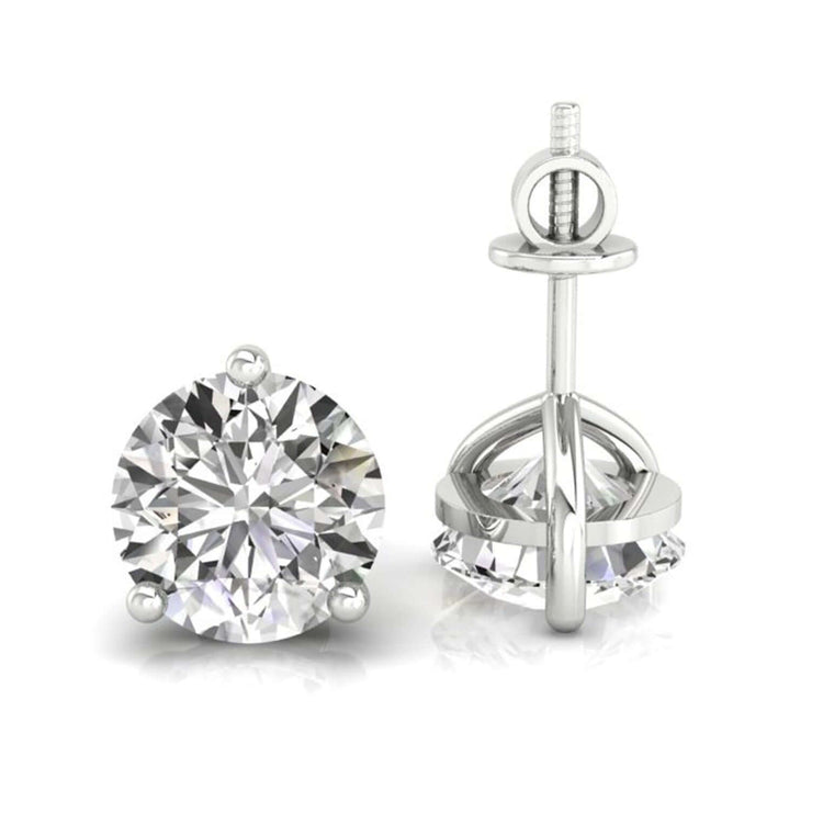 Gold stud earrings for women with round cut diamonds.
