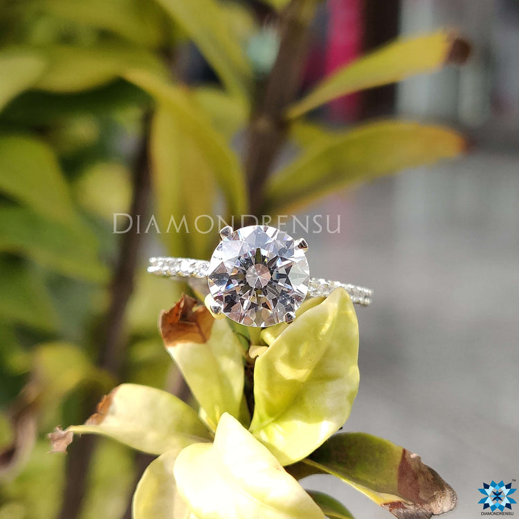 White gold moissanite ring designed with classic elegance and modern sparkle.