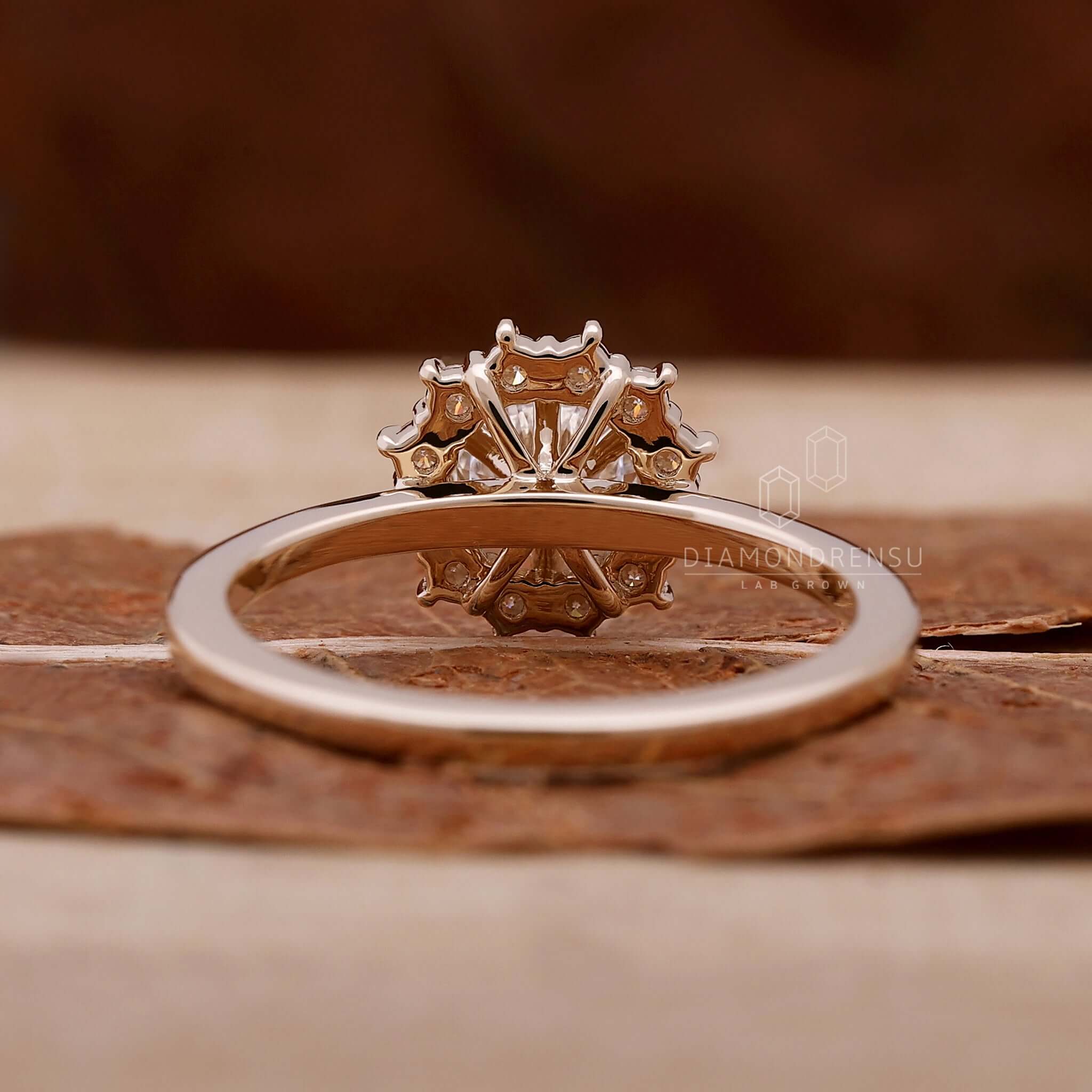 Vintage-inspired cluster diamond ring in a handcrafted design.