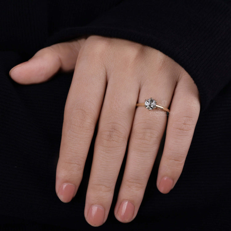 Cathedral setting engagement ring featuring a Jubilee cut diamond for elegance
