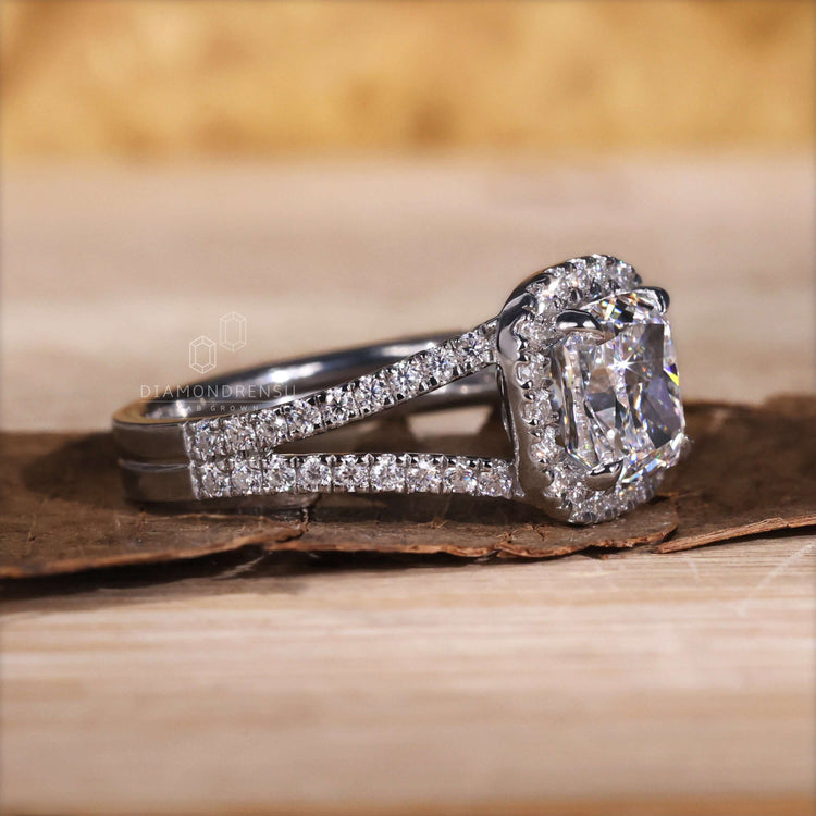 Cushion cut ring diamond showcasing brilliance in a split shank ring.
