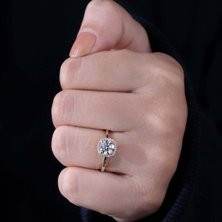 Round brilliant diamond ring with a sleek and modern handmade design.