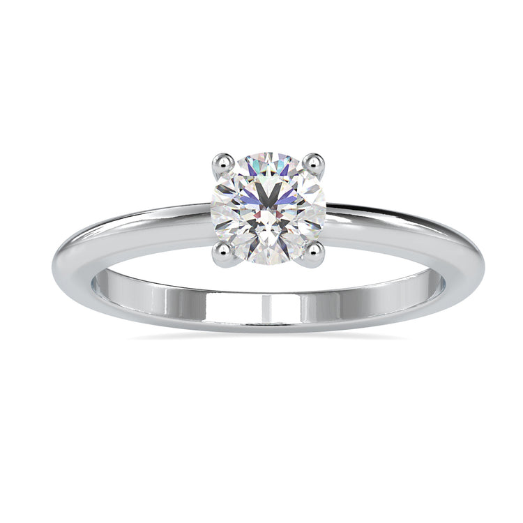 Gold solitaire diamond ring with round cut lab grown stone.
