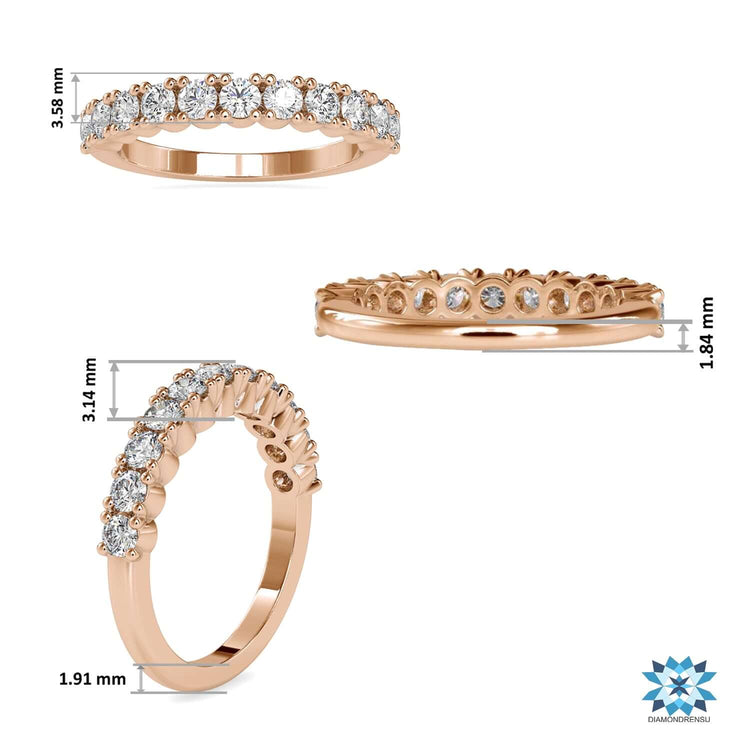 Lab grown diamond band set in rose gold with shared prongs.
