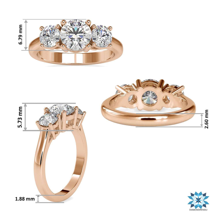 White gold ring with three round diamonds and classic design.
